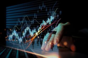 hand holding a pen working on virtual trading chart
