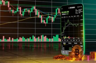 close up of trading chart and cellphone that is green and black