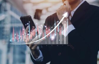 man looking at phone with forex chart overlay