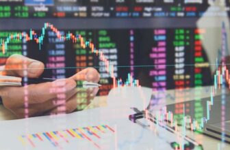 data sheets and forex screen showing prices