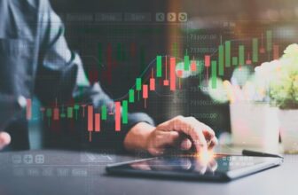 virtual forex chart with tablet behind on table
