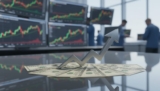 Dollar Edges Higher as Traders Rethink Fed Rate-Cut Timeline